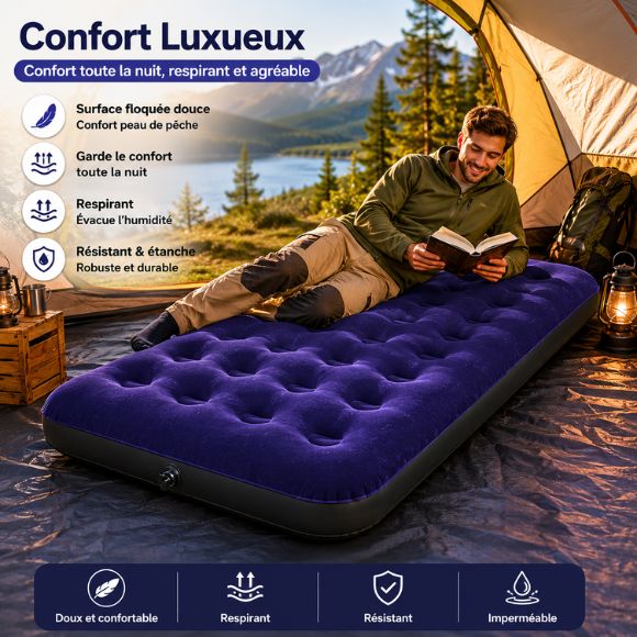 Matelas Gonflable 1 Personne offrant un confort luxueux pour le camping, installé sous une tente avec vue sur un lac et des montagnes, idéal pour la randonnée, le bivouac et les nuits en pleine nature.
